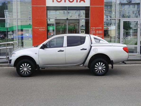 Mitsubishi L200 IV с пробегом 2011 года, цена 889 000 рублей, 325404 км, offers.body_type.unknown, Автокод Объявления