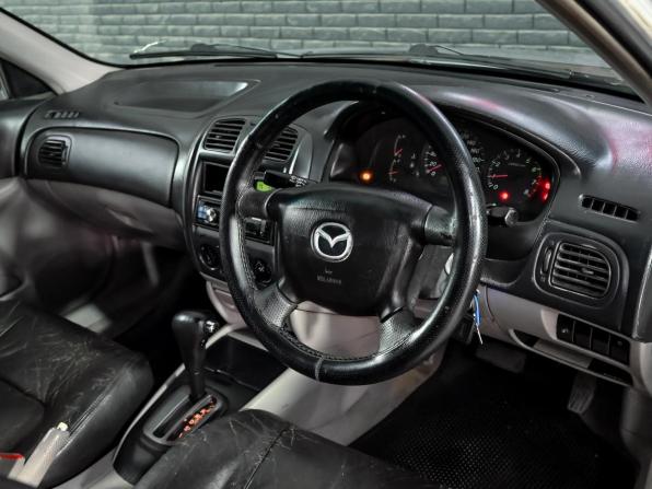 Mazda 323 VI (BJ) Рестайлинг с пробегом 2001 года, цена 200 000 рублей, 452064 км, седан, Автокод Объявления