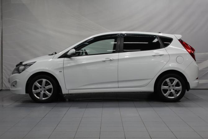 Hyundai Solaris I Рестайлинг с пробегом 2015 года, цена 990 000 рублей, 149492 км, хэтчбек, Автокод Объявления