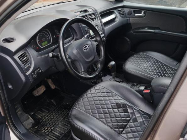 Kia Sportage II Рестайлинг с пробегом 2009 года, цена 900 000 рублей, 198064 км, внедорожник, Автокод Объявления
