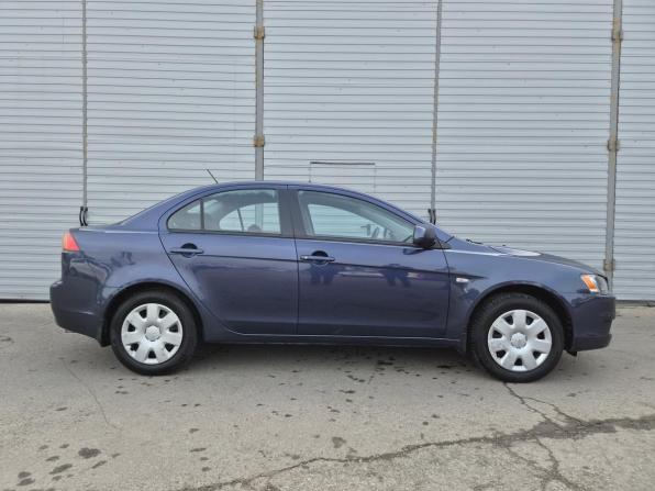 Mitsubishi Lancer X с пробегом 2009 года, цена 650 000 рублей, 185283 км, седан, Автокод Объявления
