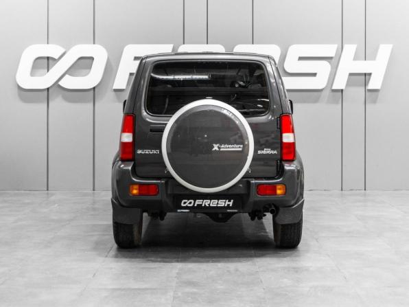Suzuki Jimny III Рестайлинг 2 с пробегом 2013 года, цена 1 349 000 рублей, 51139 км, внедорожник, Автокод Объявления