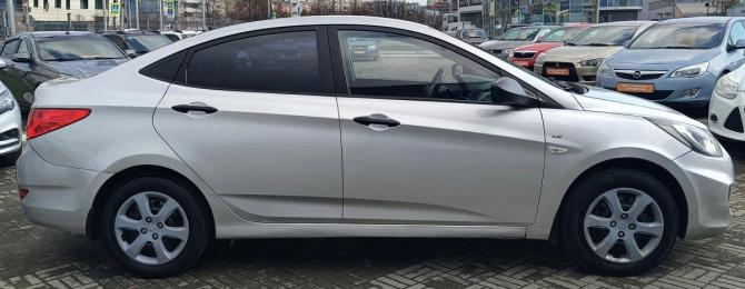 Hyundai Solaris I с пробегом 2014 года, цена 670 000 рублей, 211000 км, седан, Автокод Объявления