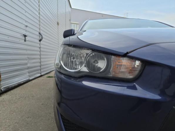 Mitsubishi Lancer X с пробегом 2009 года, цена 650 000 рублей, 185283 км, седан, Автокод Объявления