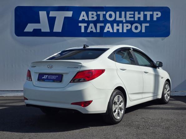 Hyundai Solaris I Рестайлинг с пробегом 2015 года, цена 970 000 рублей, 155000 км, седан, Автокод Объявления