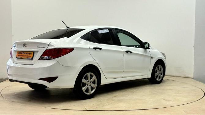 Hyundai Solaris I Рестайлинг с пробегом 2015 года, цена 699 500 рублей, 199489 км, седан, Автокод Объявления