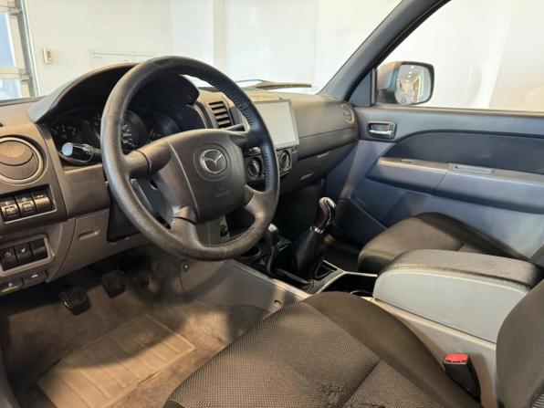 Mazda BT-50 I Рестайлинг с пробегом 2010 года, цена 980 000 рублей, 176464 км, пикап, Автокод Объявления