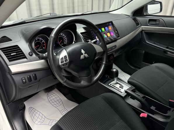Mitsubishi Lancer X Рестайлинг с пробегом 2013 года, цена 1 299 000 рублей, 105000 км, седан, Автокод Объявления