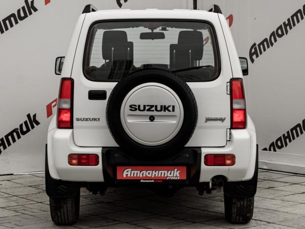 Suzuki Jimny III Рестайлинг 2 с пробегом 2013 года, цена 1 500 000 рублей, 52577 км, внедорожник, Автокод Объявления