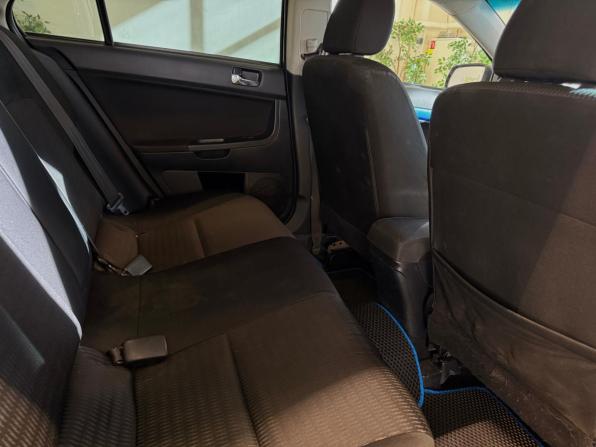 Mitsubishi Lancer X Рестайлинг с пробегом 2011 года, цена 650 000 рублей, 208000 км, седан, Автокод Объявления