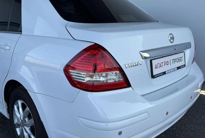 Nissan Tiida I Рестайлинг с пробегом 2013 года, цена 735 000 рублей, 148070 км, седан, Автокод Объявления