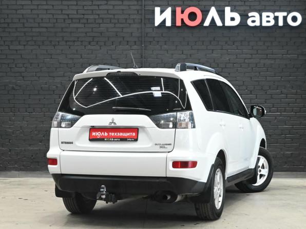 Mitsubishi Outlander II Рестайлинг с пробегом 2012 года, цена 1 330 000 рублей, 301775 км, внедорожник, Автокод Объявления