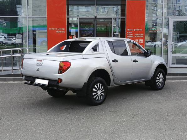 Mitsubishi L200 IV с пробегом 2011 года, цена 889 000 рублей, 325404 км, offers.body_type.unknown, Автокод Объявления