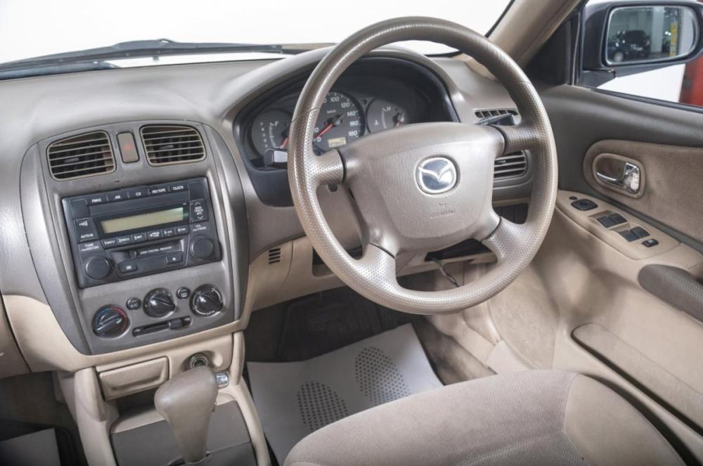 Mazda Familia VIII (BJ) Томск  - изображение 10