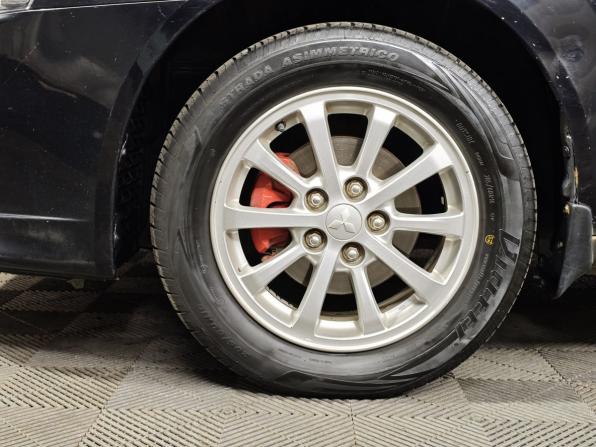 Mitsubishi Lancer X Рестайлинг с пробегом 2012 года, цена 599 000 рублей, 316139 км, седан, Автокод Объявления