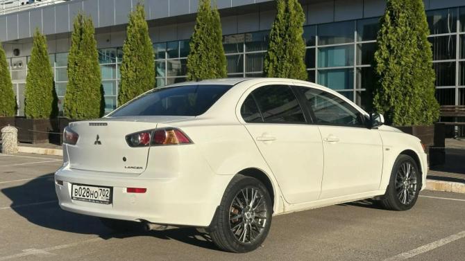Mitsubishi Lancer X Рестайлинг с пробегом 2013 года, цена 695 000 рублей, 205355 км, седан, Автокод Объявления
