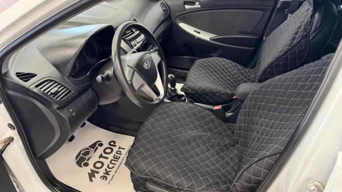 Hyundai Solaris I Рестайлинг с пробегом 2014 года, цена 650 000 рублей, 183065 км, седан, Автокод Объявления