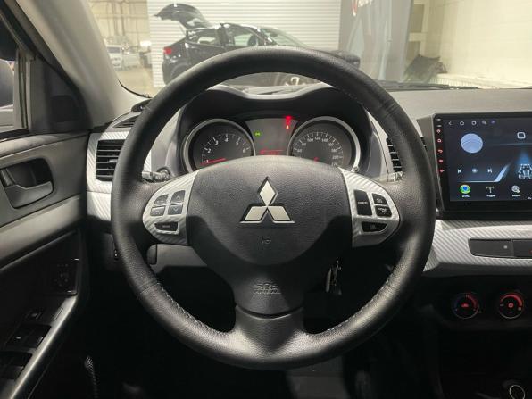 Mitsubishi Lancer X Рестайлинг с пробегом 2014 года, цена 750 000 рублей, 205453 км, седан, Автокод Объявления