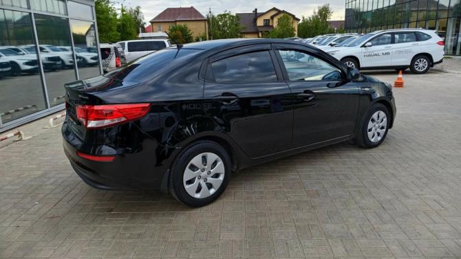 Kia Rio III Рестайлинг с пробегом 2015 года, цена 1 149 900 рублей, 61505 км, седан, Автокод Объявления