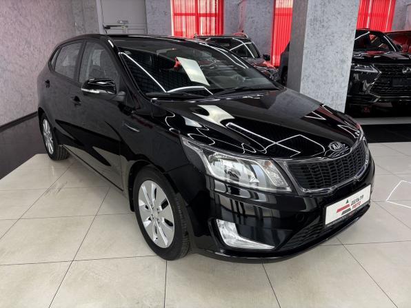 Kia Rio III Рестайлинг с пробегом 2015 года, цена 1 365 000 рублей, 33893 км, хэтчбек, Автокод Объявления