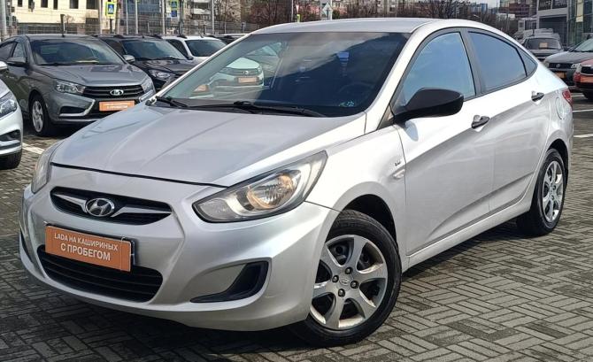 Hyundai Solaris I с пробегом 2014 года, цена 670 000 рублей, 211000 км, седан, Автокод Объявления