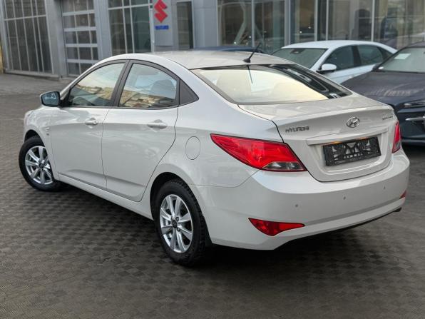 Hyundai Solaris I Рестайлинг с пробегом 2014 года, цена 1 079 000 рублей, 56983 км, седан, Автокод Объявления