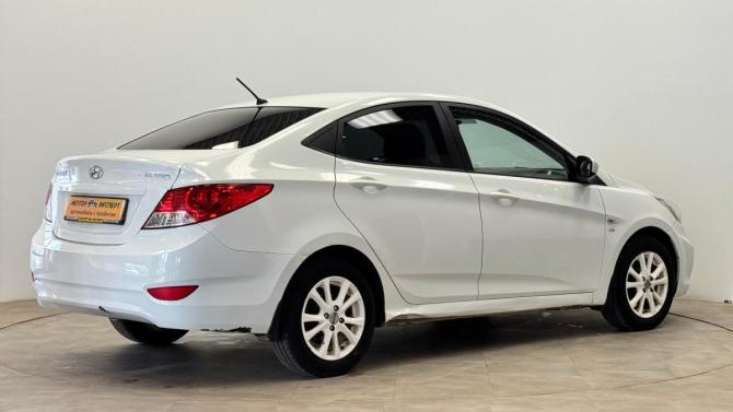 Hyundai Solaris I Рестайлинг с пробегом 2014 года, цена 650 000 рублей, 183065 км, седан, Автокод Объявления