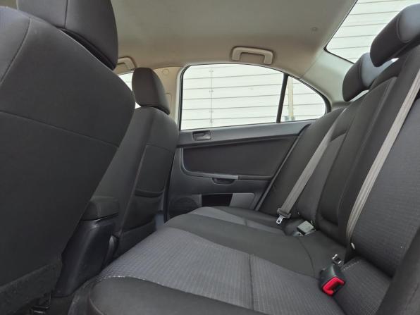 Mitsubishi Lancer X с пробегом 2009 года, цена 650 000 рублей, 185283 км, седан, Автокод Объявления