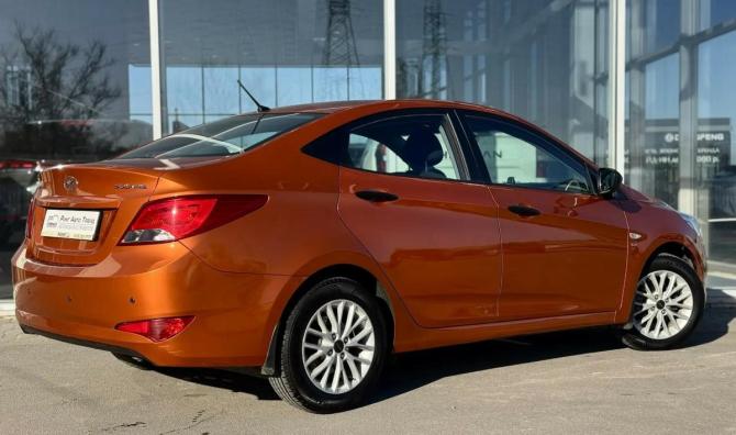 Hyundai Solaris I Рестайлинг с пробегом 2015 года, цена 1 070 000 рублей, 112000 км, седан, Автокод Объявления