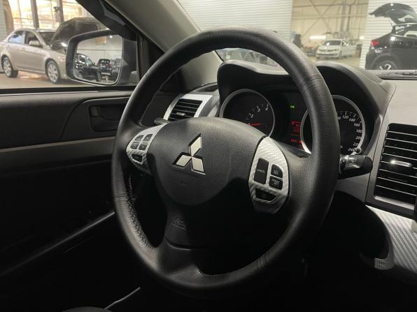 Mitsubishi Lancer X Рестайлинг с пробегом 2014 года, цена 750 000 рублей, 205453 км, седан, Автокод Объявления