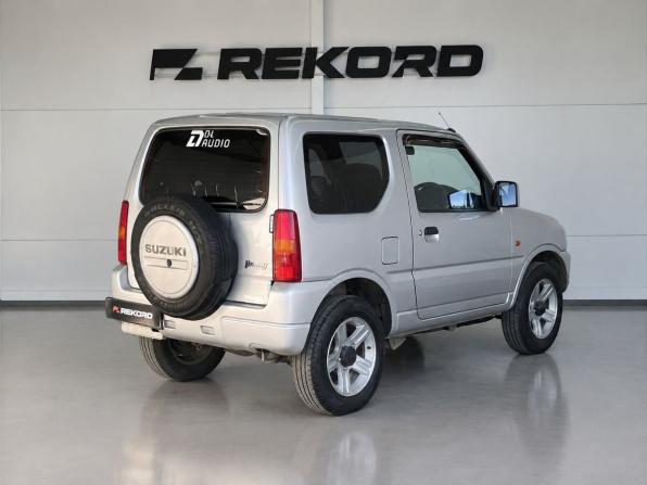 Suzuki Jimny III Рестайлинг 2 с пробегом 2012 года, цена 1 089 000 рублей, 122818 км, внедорожник, Автокод Объявления