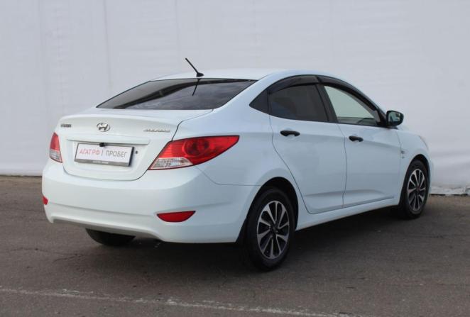 Hyundai Solaris I с пробегом 2014 года, цена 640 000 рублей, 211007 км, седан, Автокод Объявления