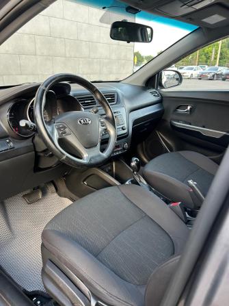 Kia Rio III Рестайлинг с пробегом 2015 года, цена 1 060 000 рублей, 137300 км, седан, Автокод Объявления